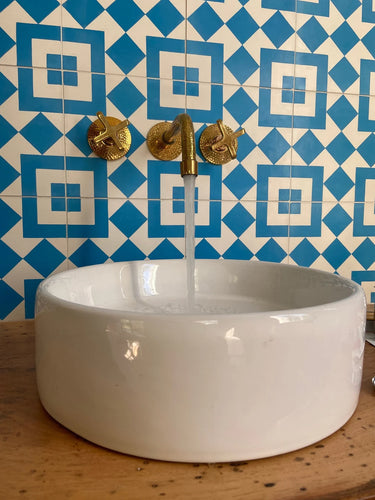 Unlacquered brass vintage wall mounted bathroom faucet with hammered finish & flat cross handles